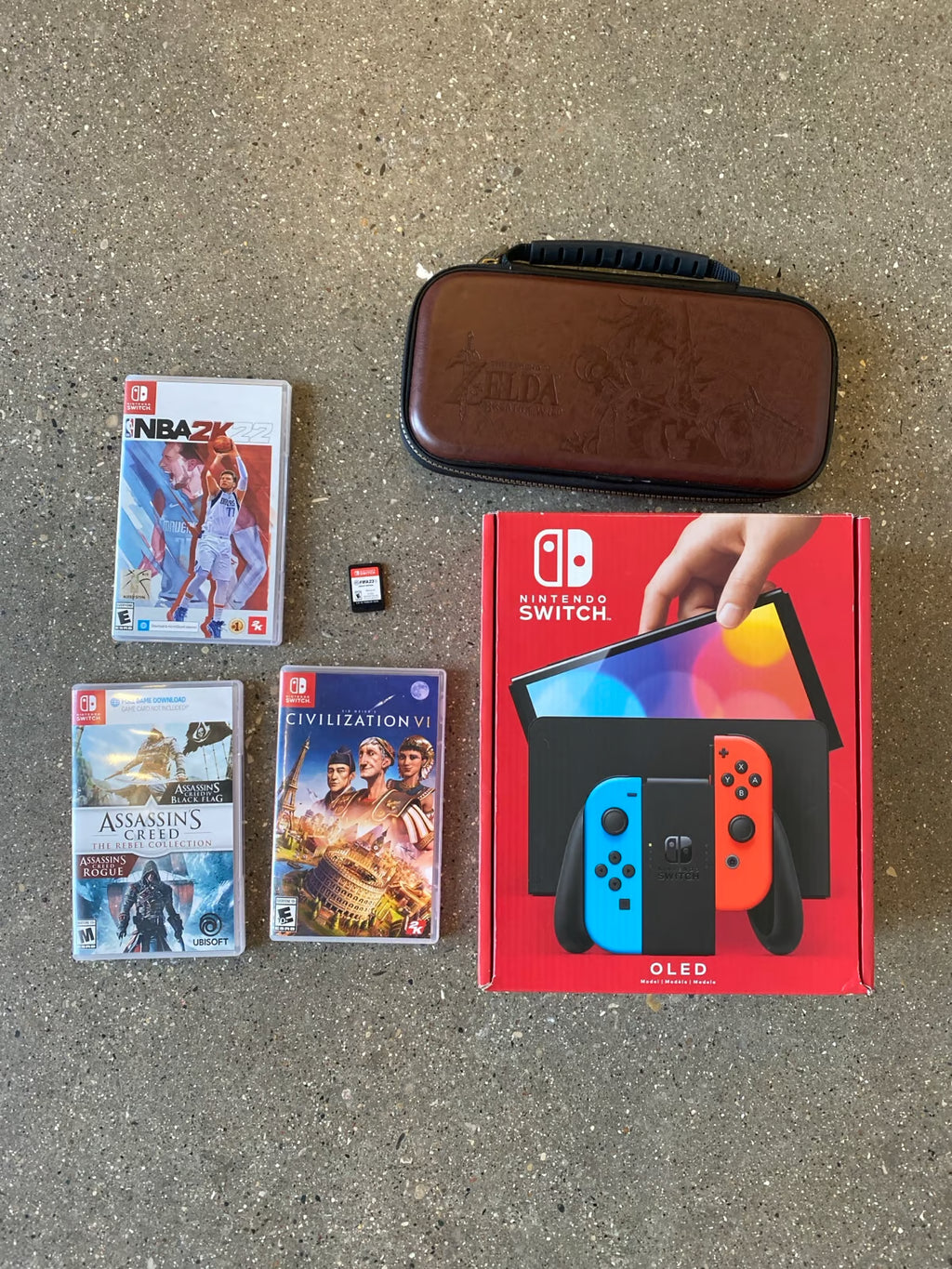 Nintendo switch oled with games (New Condition) 9C65