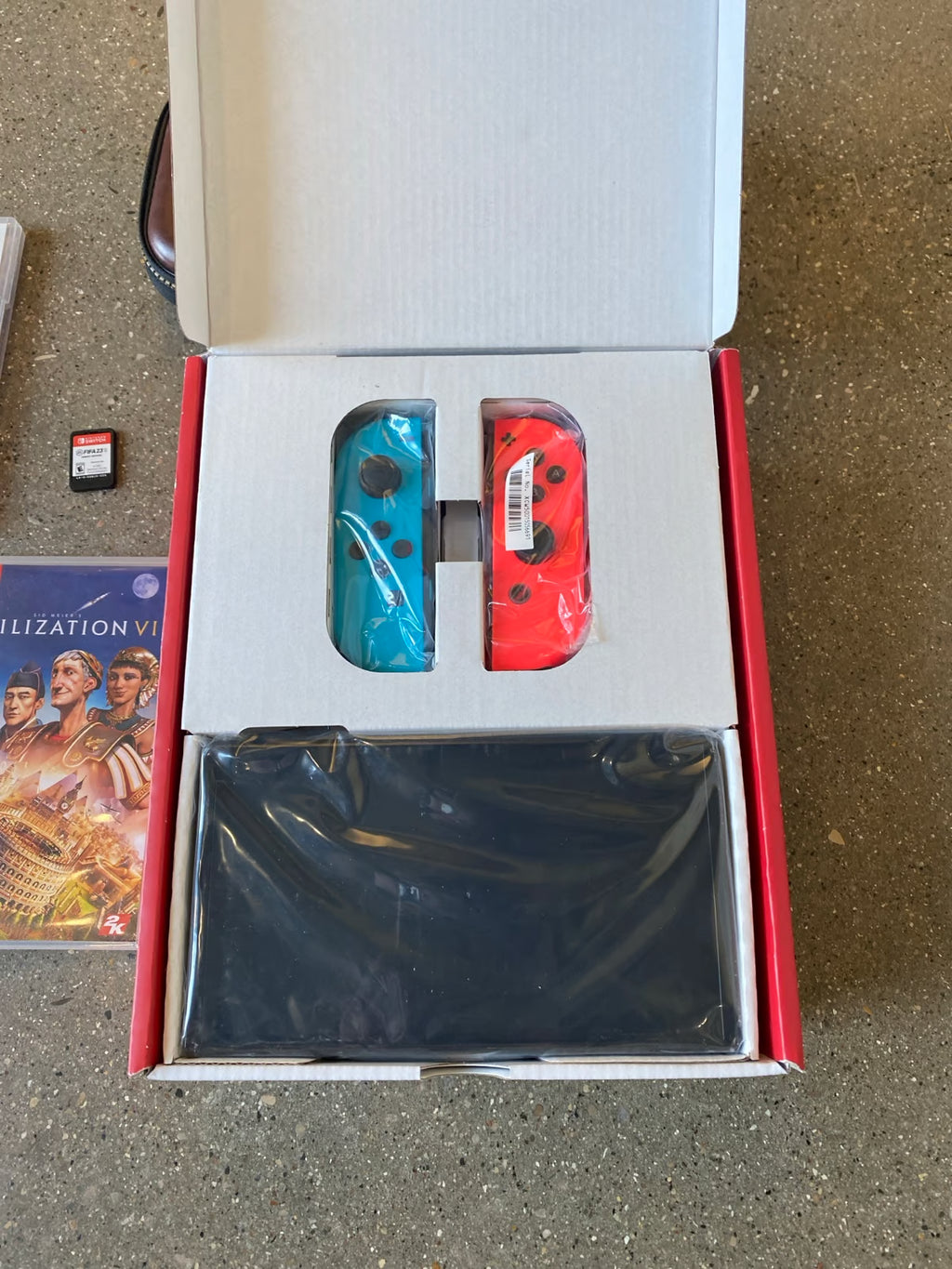 Nintendo switch oled with games (New Condition) 9C65