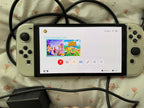 OLED white Nintendo Switch 2O95