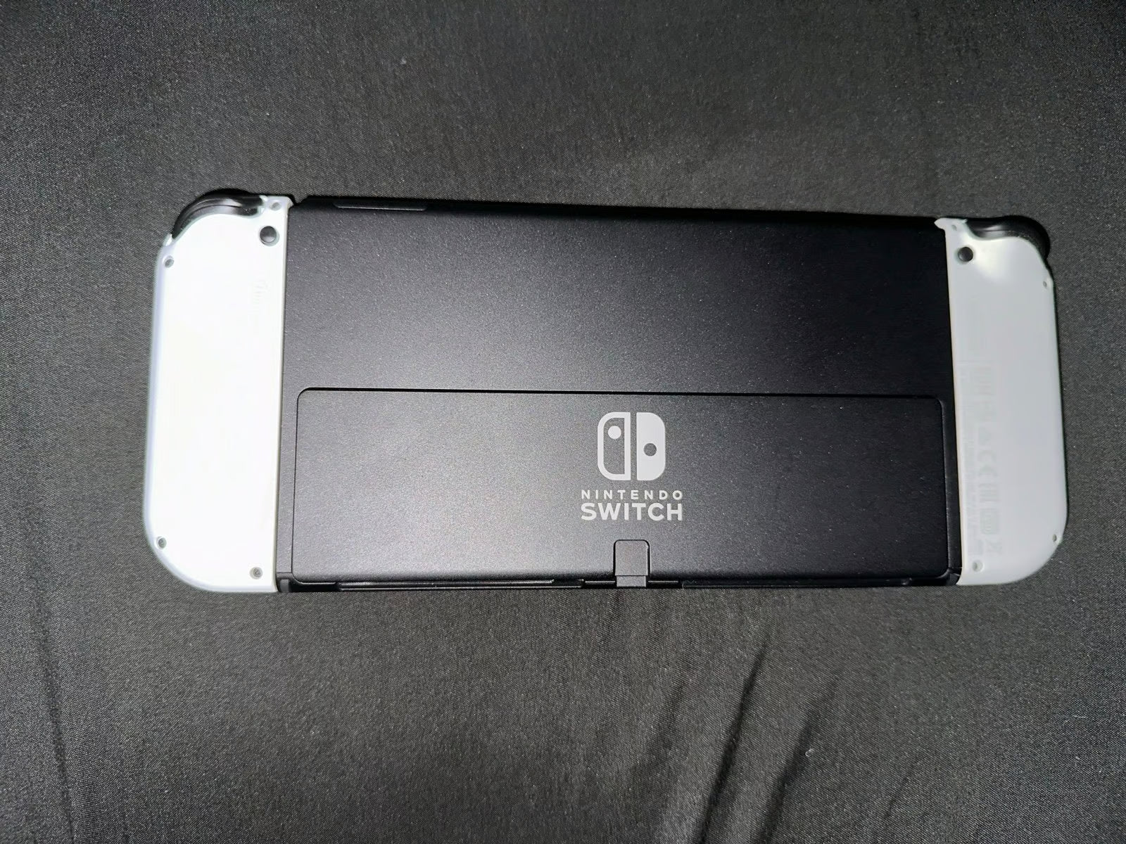 Nintendo Switch Oled White Comes With Mario Strikers and Ring Fit Adventure 9J58