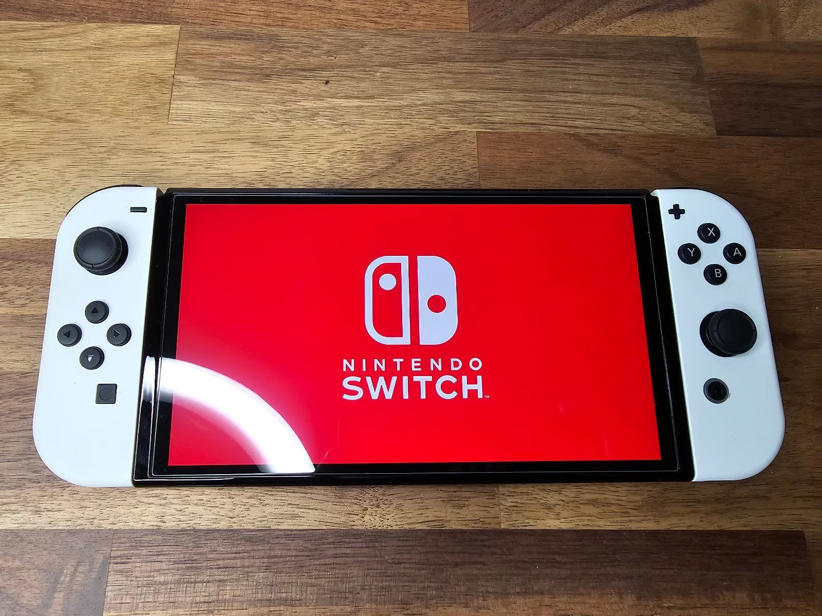 Nintendo Switch OLED 64GB + 128GB SD Handheld Console w/Joy-Con White & 5 Games 7K32