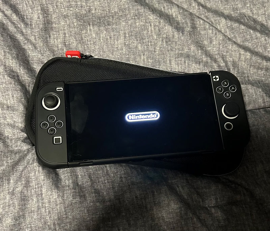 Nintendo Switch OLED with Protective Case 9T38