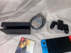 Nintendo switch oled + Two Games 7M37