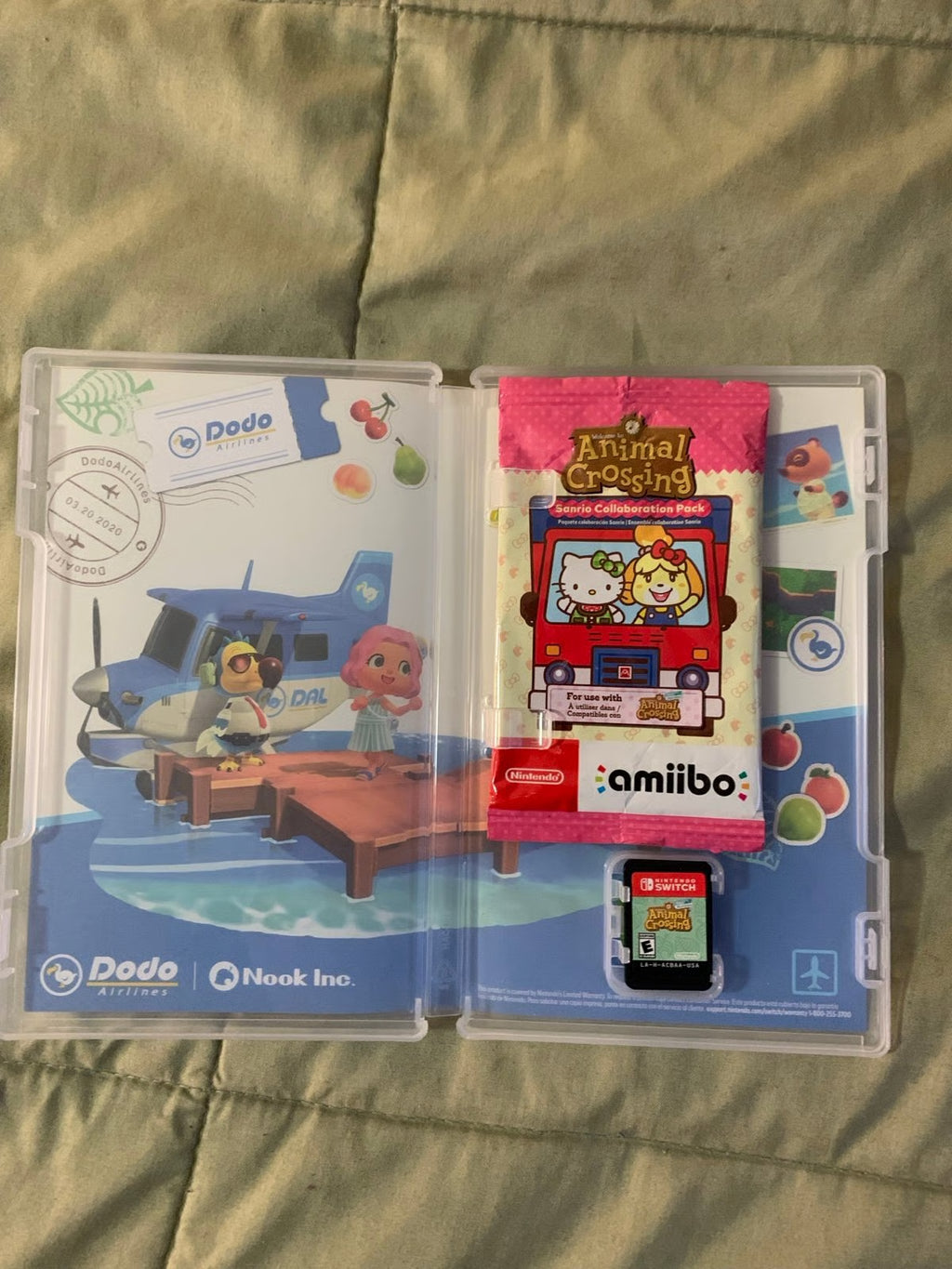 Barely used Nintendo Switch OLED with games travel case and extra controller 3K57