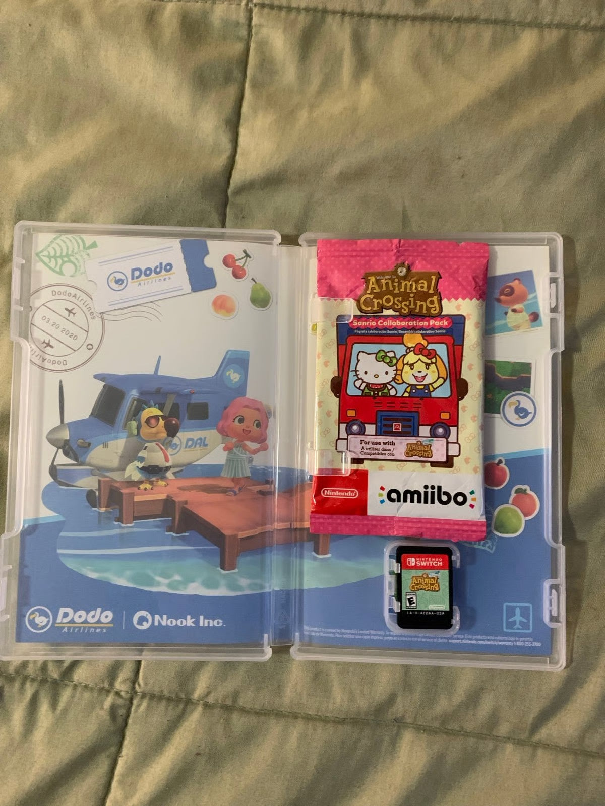 Barely used Nintendo Switch OLED with games travel case and extra controller 3K57