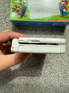 New Nintendo 3ds Mario white edition