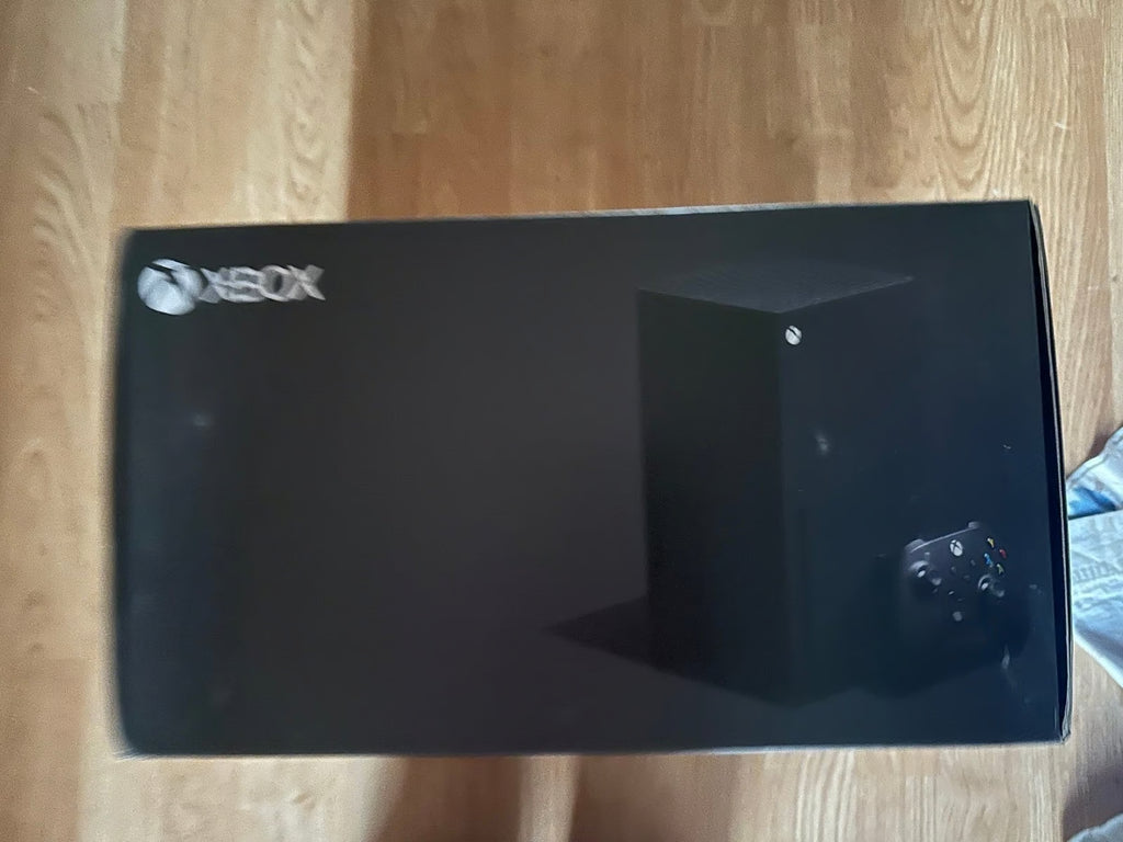 Never opened Xbox Series X w/headset 8Q39