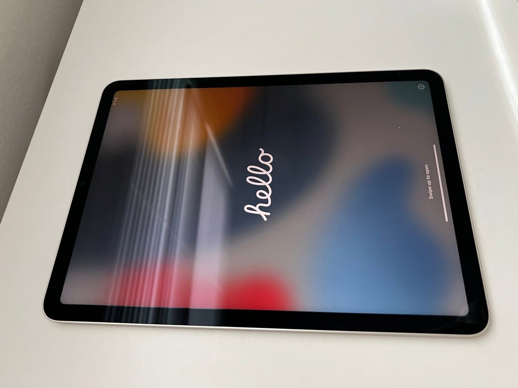 Apple iPad Air 5th Generation 64 GB in Starlight + Apple Pencil 8O99