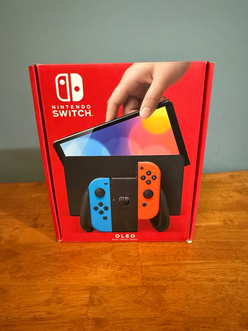 Nintendo Switch OLED Neon Red and Blue 7O21