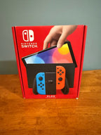 Nintendo Switch OLED Neon Red and Blue 7O21