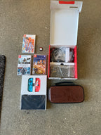 Nintendo switch oled with games (New Condition) 9C65