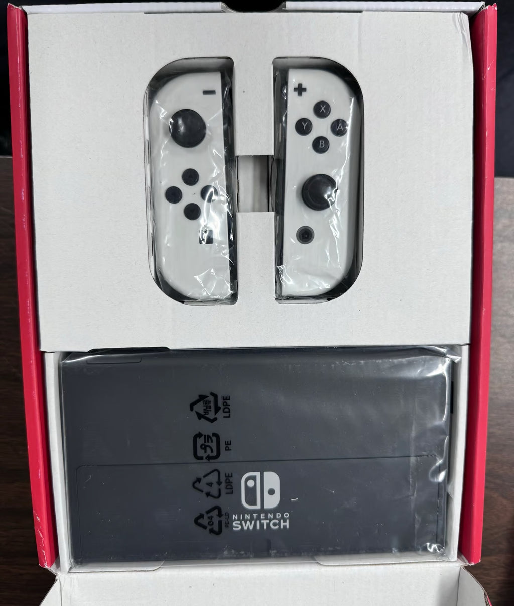 Nintendo Switch (OLED model) with White Joy-Con new in box 6K79