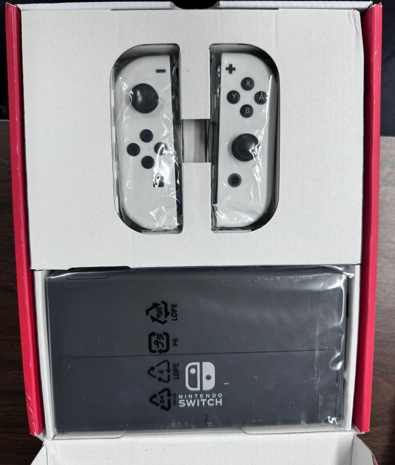 Nintendo Switch (OLED model) with White Joy-Con new in box 6K79
