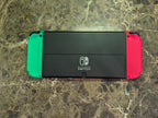 Nintendo Switch OLED + Satisfye Grip & 128 GB expandable storage. 9D71