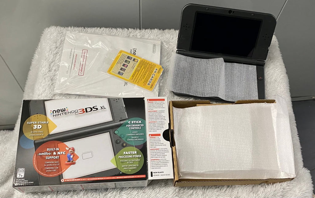 New Nintendo 3ds XL Black Complete In Box Barely Used.