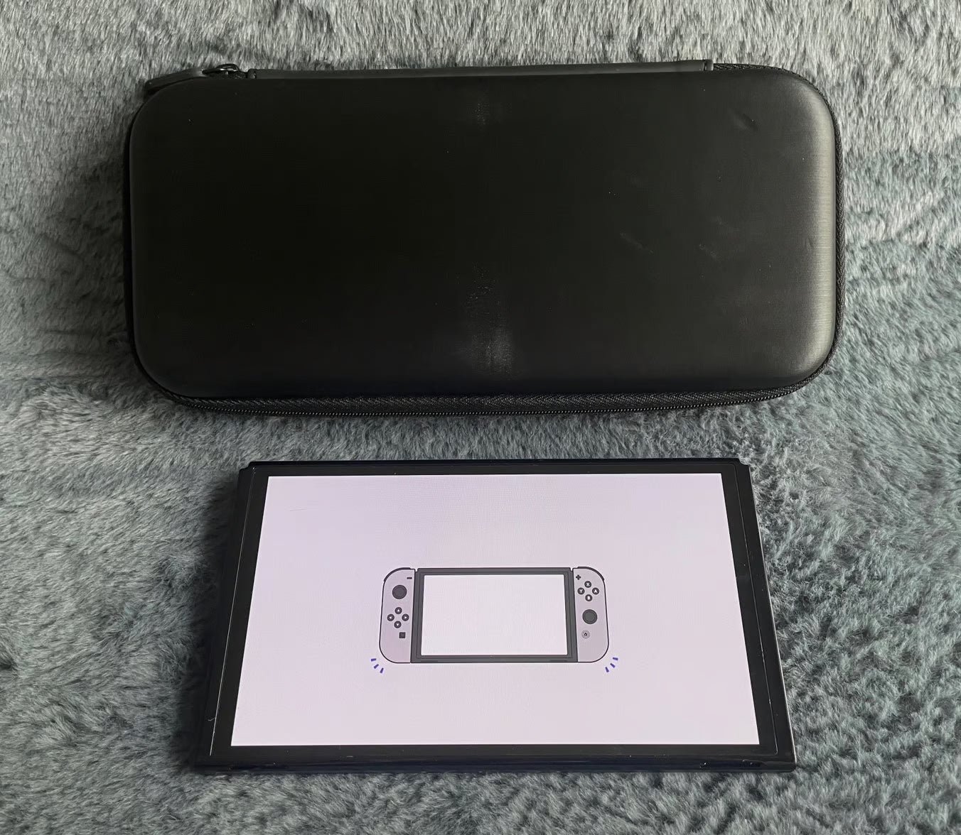 Nintendo Switch OLED console tablet with carry case 1N99