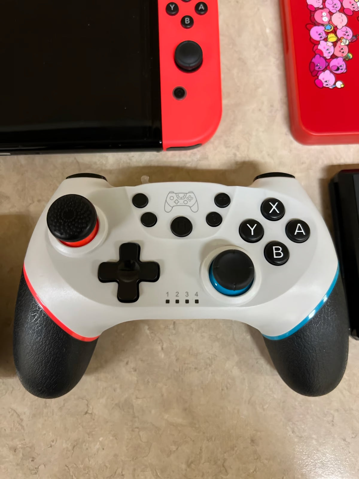 Nintendo switch oled bundle w/2 BRAND NEW WIRELESS CONTROLLERS 2K81