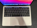MacBook Pro with TouchBar 8A75