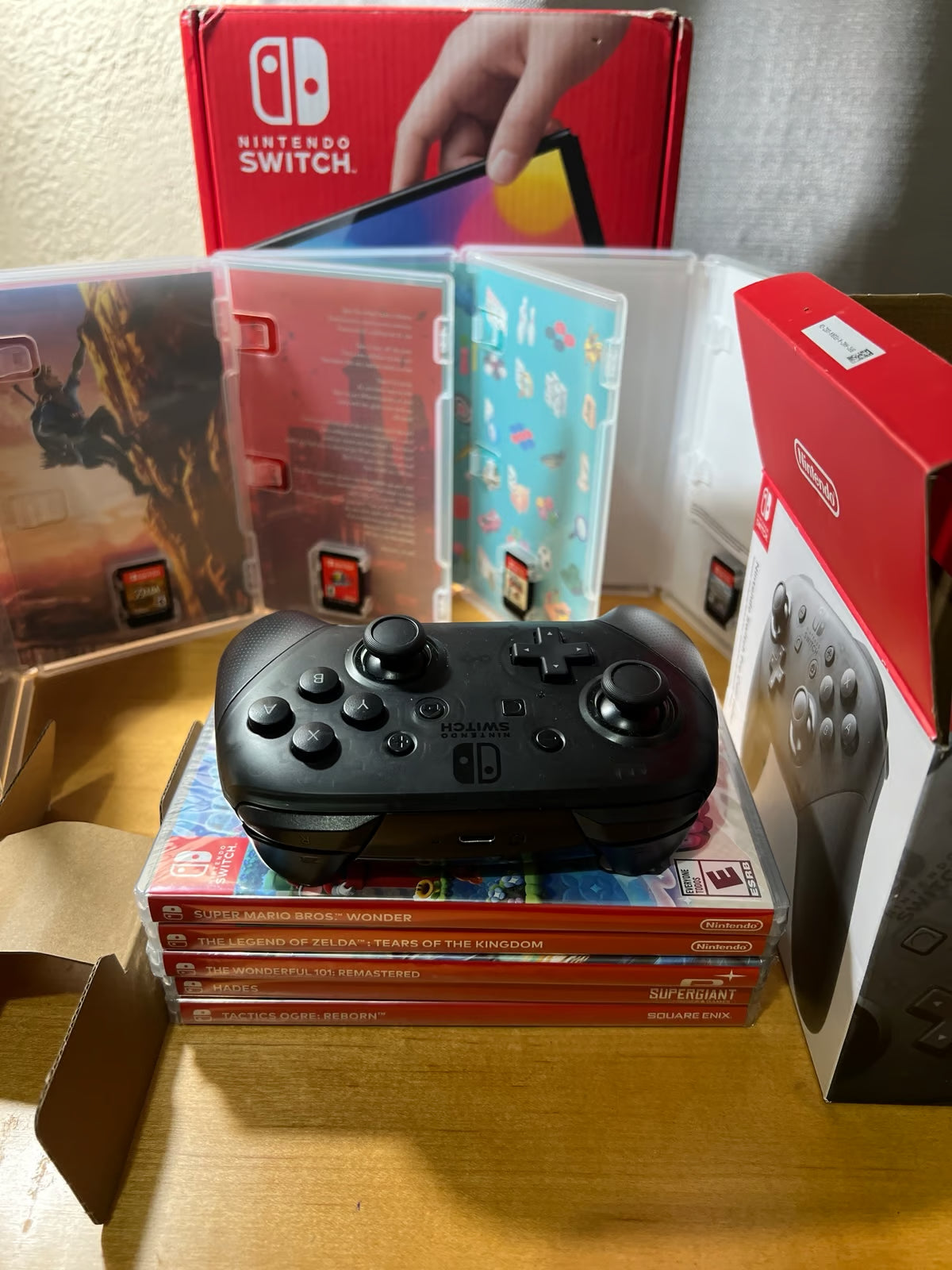 Nintendo Switch OLED + 9 Must Play Highly Rated Titles 9T89