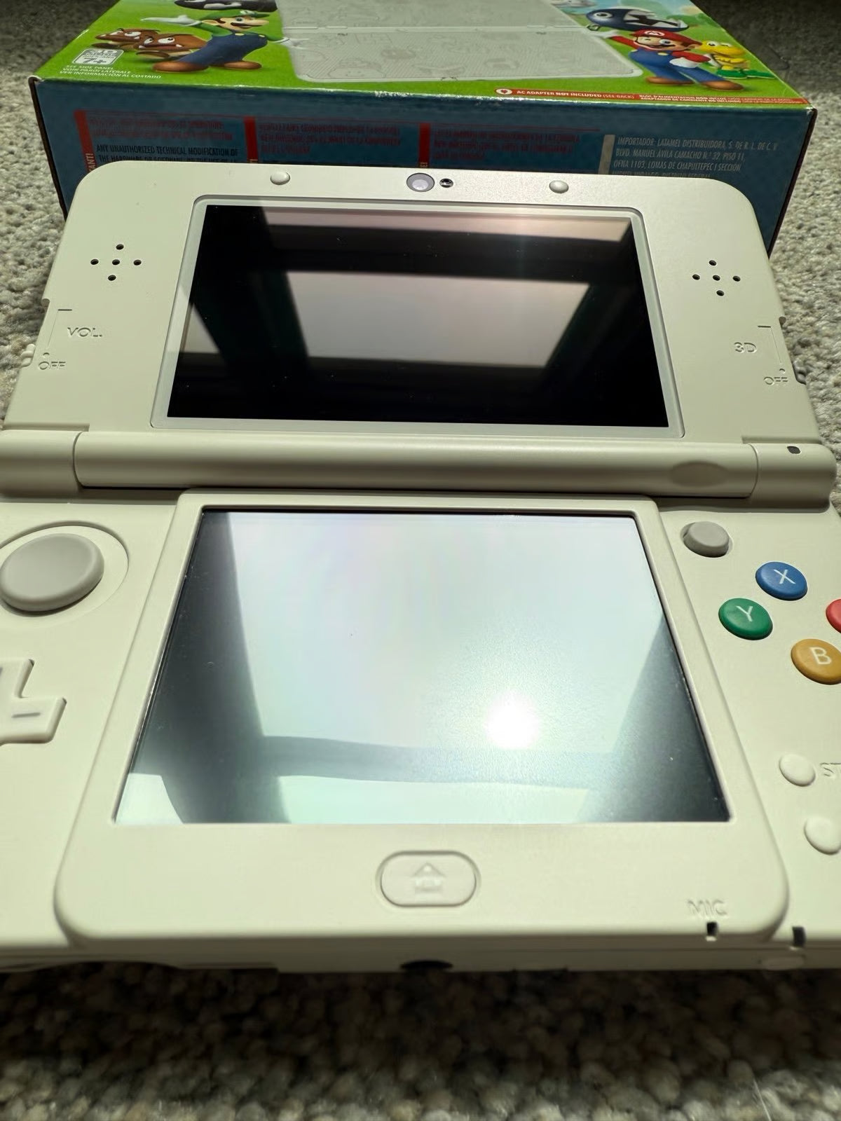 New Nintendo 3ds Mario white edition