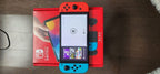 Nintendo Switch OLED bundle with games 6K75