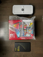 Nintendo Switch OLED bundle with games 6K75