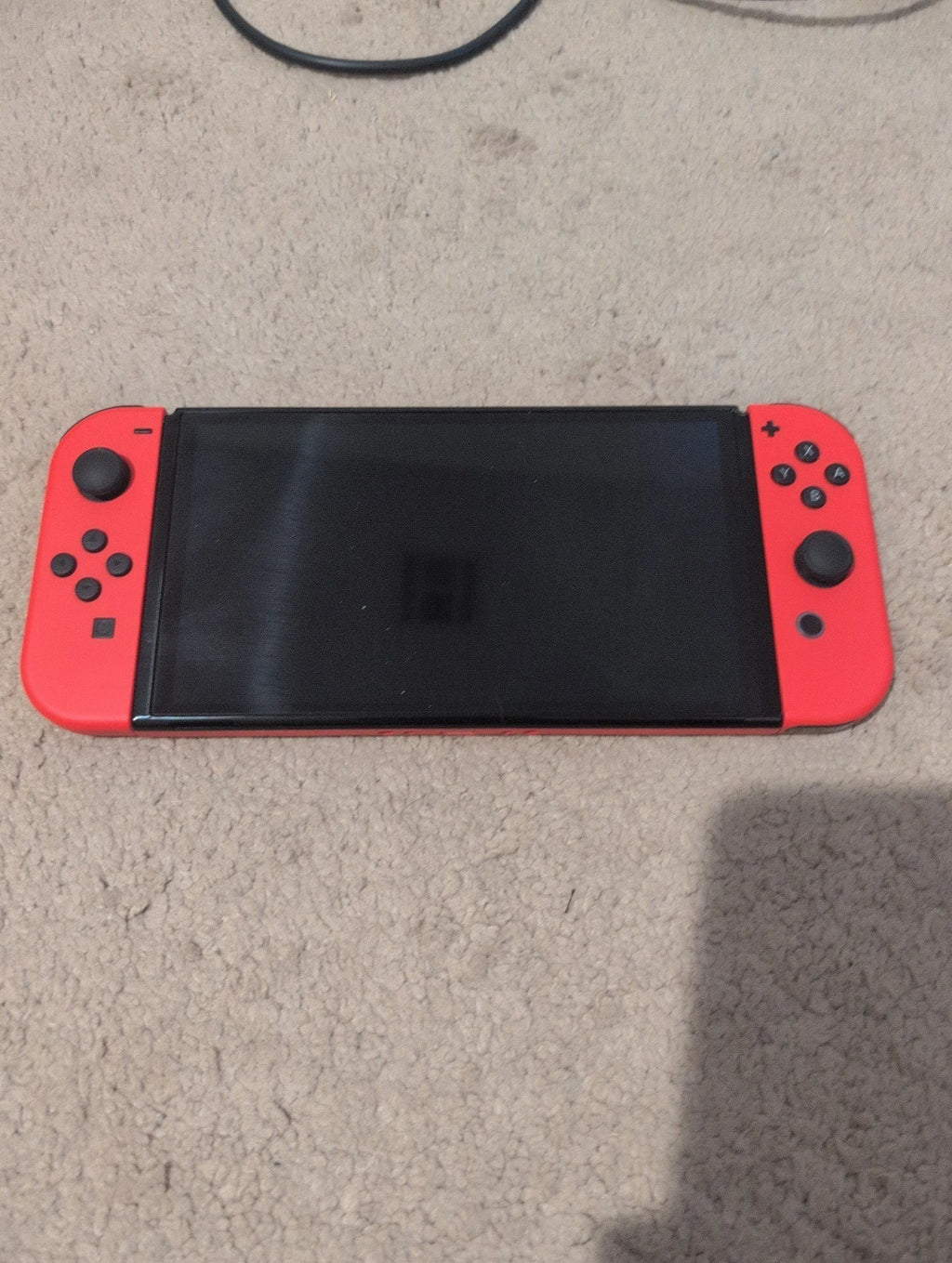 Nintendo switch oled mario edition 7L72