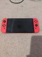 Nintendo switch oled mario edition 7L72