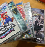 Nintendo Switch OLED + 9 Must Play Highly Rated Titles 9T89