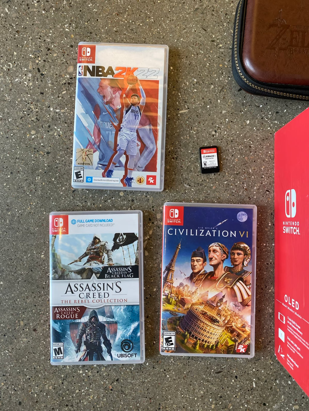 Nintendo switch oled with games (New Condition) 9C65