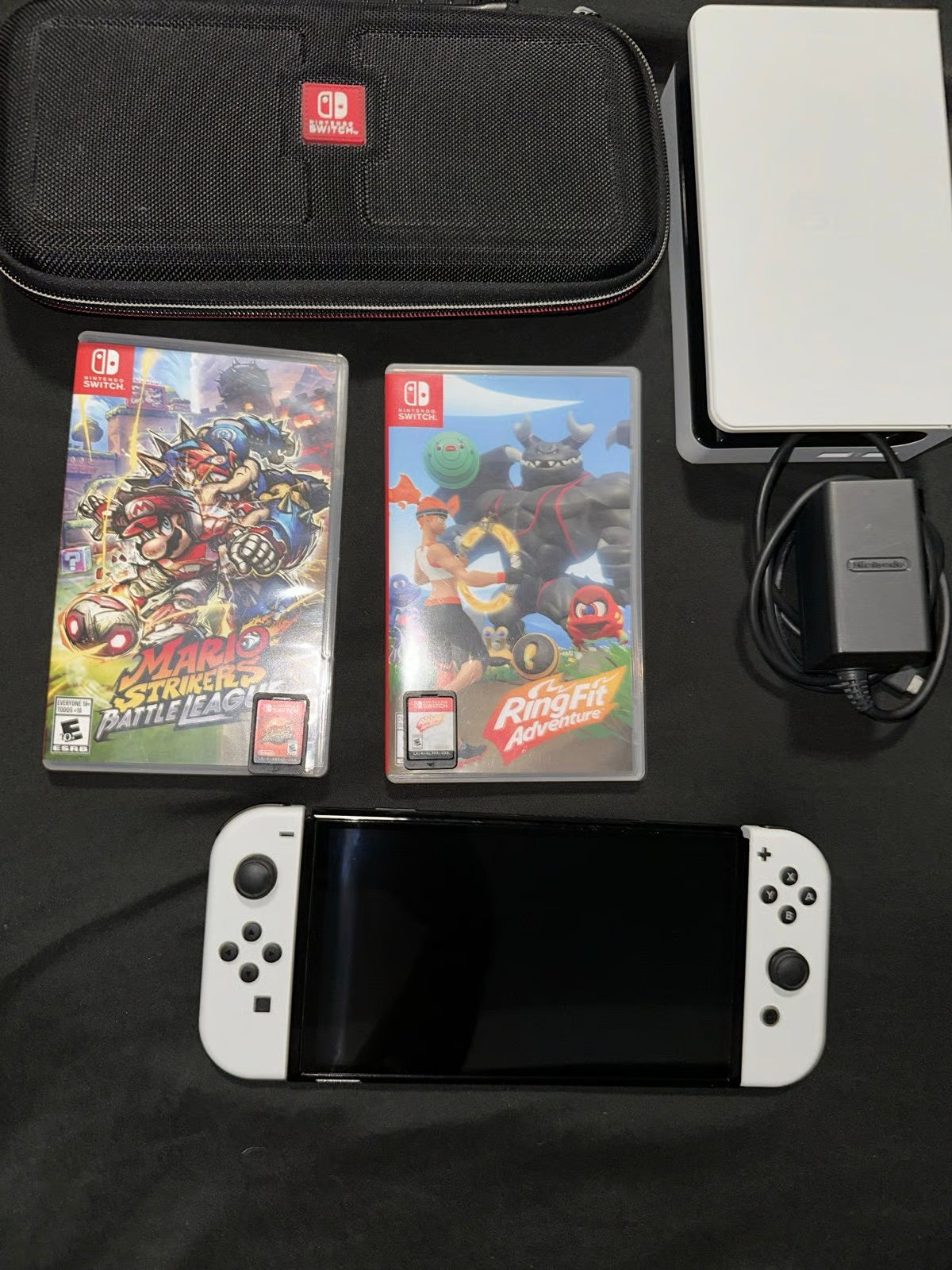 Nintendo Switch Oled White Comes With Mario Strikers and Ring Fit Adventure 9J58