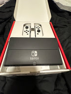OLED Nintendo Switch W/ white joycons 7E27