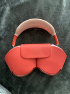 Pink apple AirPods Max 7J19