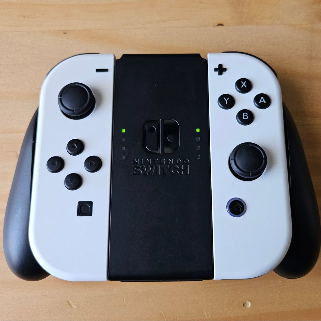 Nintendo Switch OLED + 2 Pokemon Games 3W88