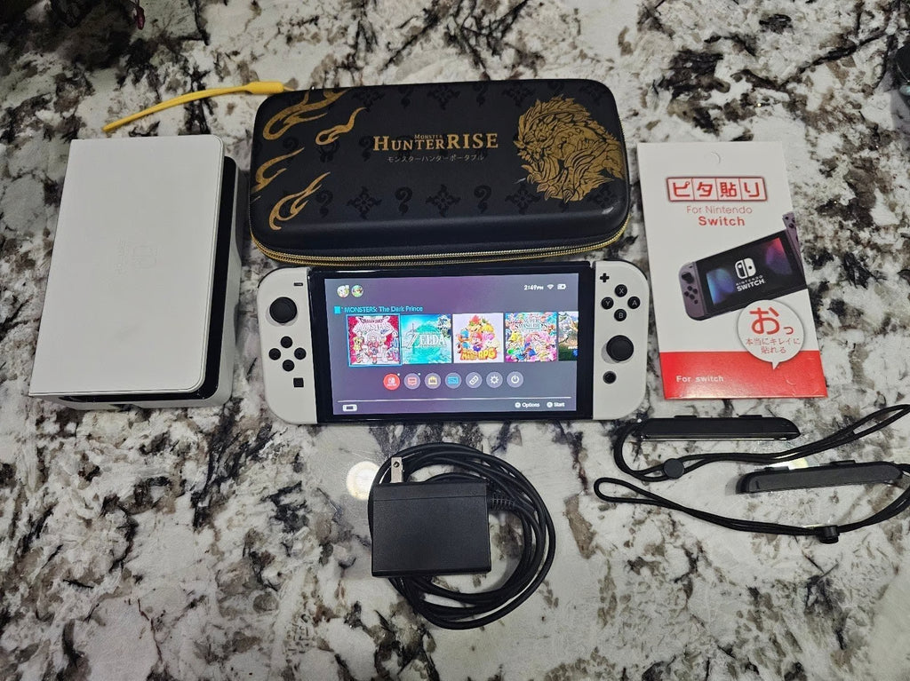 Nintendo Switch OLED + Case and Accessories! 9M73