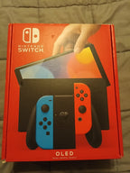Nintendo Switch oled (new unopened and 28 games) 3C21