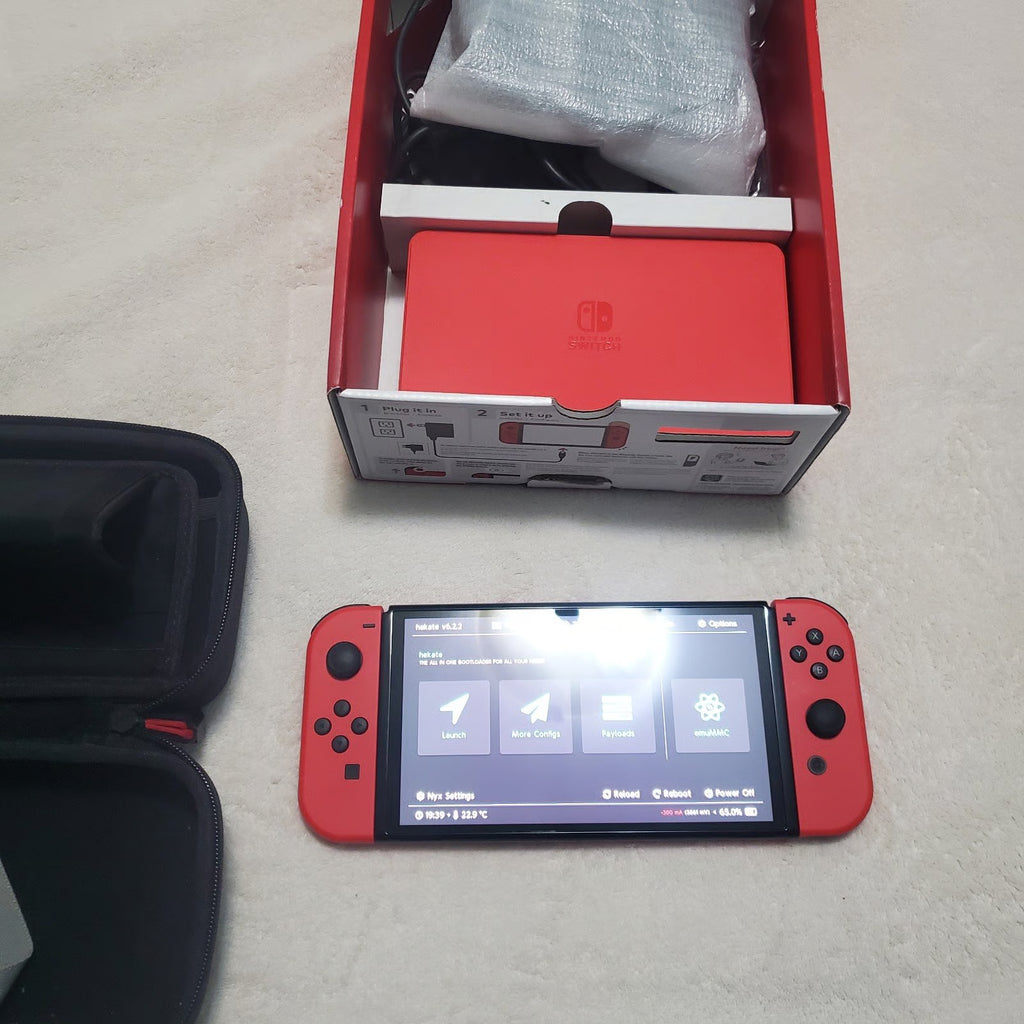 Nintendo switch oled mario with hekate rp-2040 128gb memory and all games free 1B21