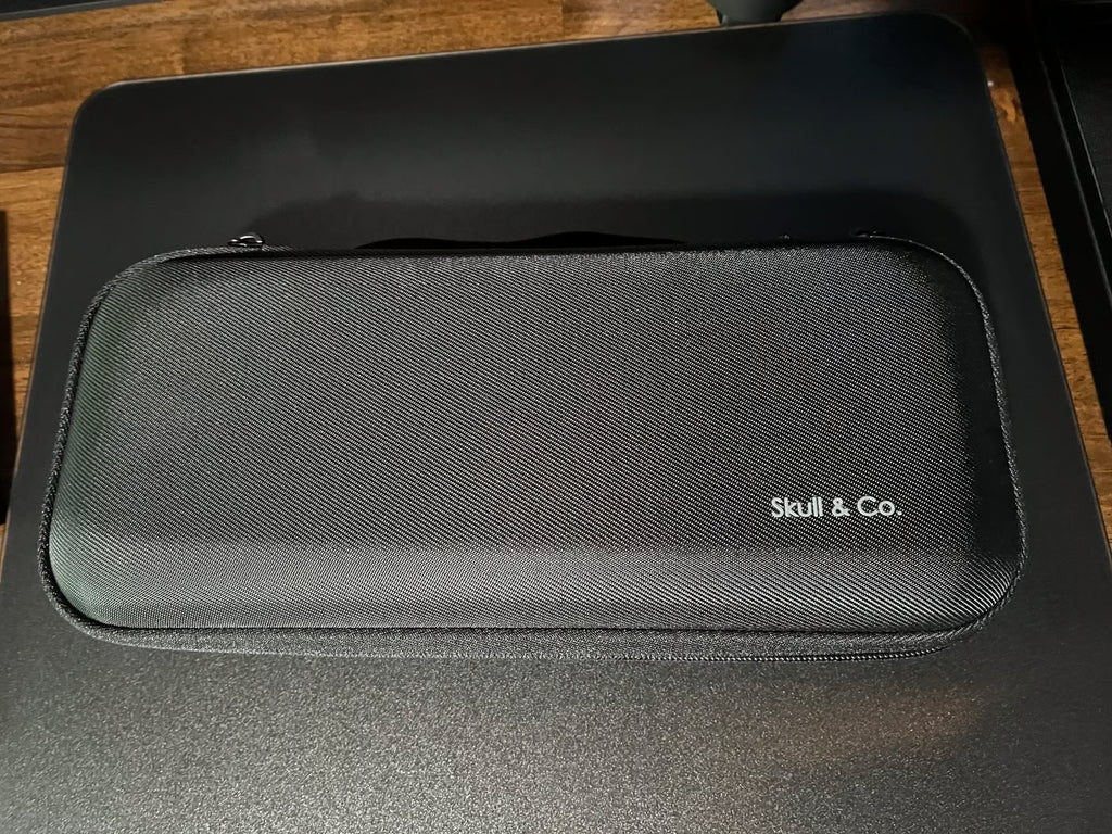 PlayStation Portal with case and earbuds 2T83