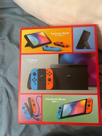 BRAND NEW OLED nintendo switch (blue and red) PRICE NEGOTIABLE 9M56