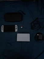 Nintendo Switch OLED with super smash bros and case 2S76