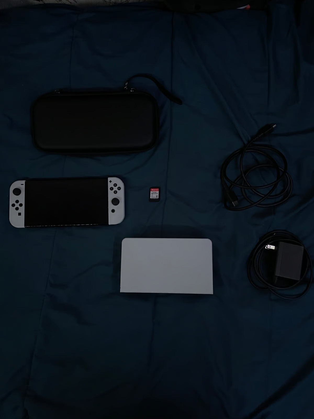 Nintendo Switch OLED with super smash bros and case 2S76