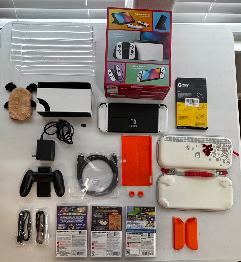 Nintendo Switch oled bundle lot set with 3 games and more 2A88