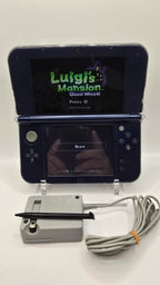 In box New Nintendo 3DS XL Galaxy Edition W/Games, charger,stylus, 128GB SD