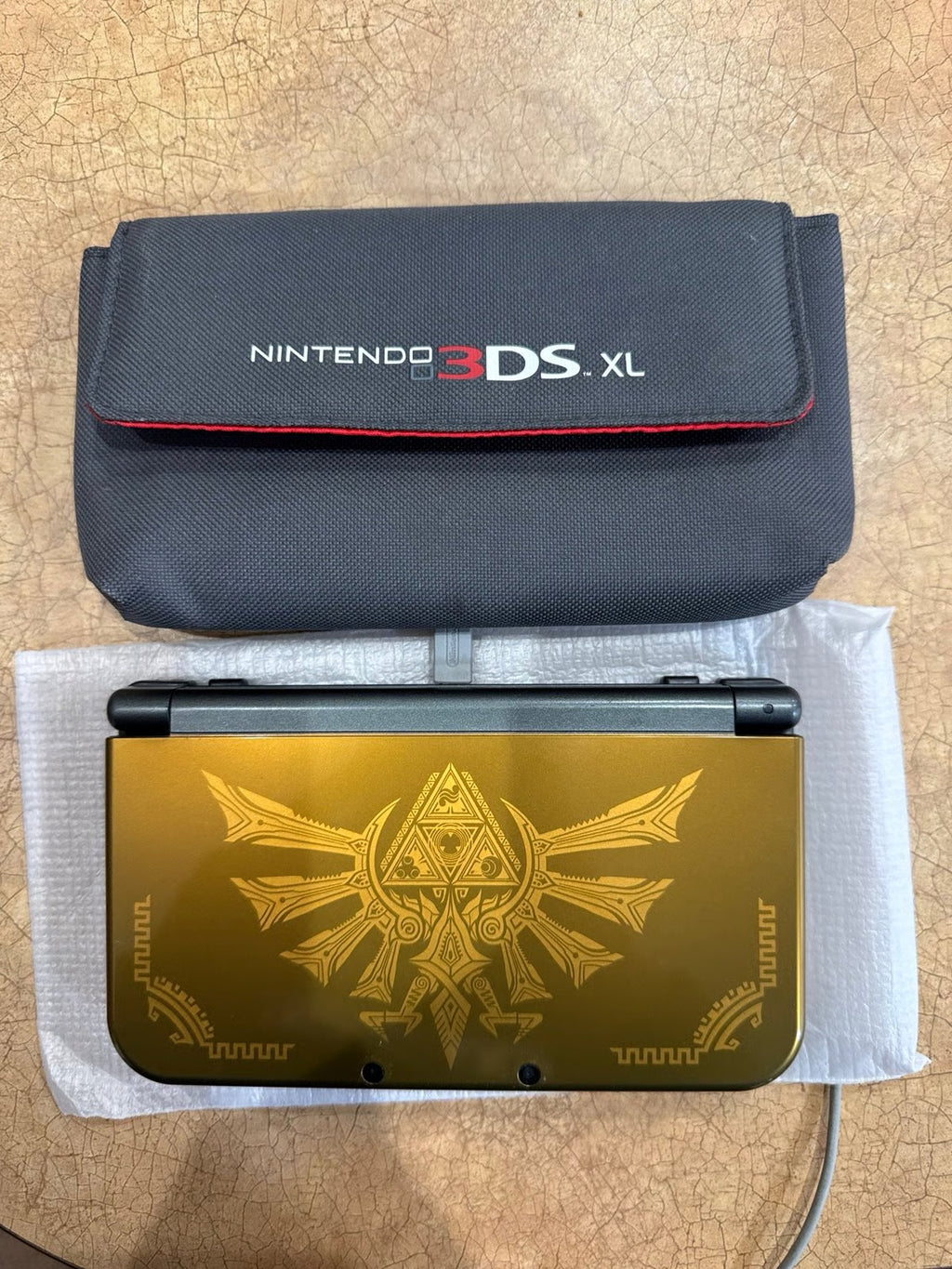 New Nintendo 3DS XL Hyrule Edition with Nintendo Charging Cable (Barely Used)