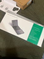 Asus Rog Ally Z1 Extreme with foldable wireless keyboard 2T53