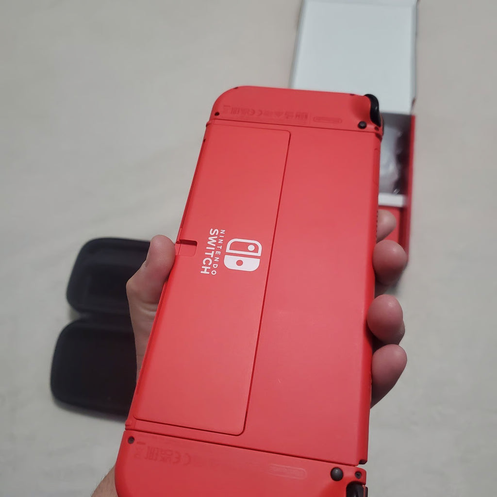 Nintendo switch oled mario with hekate rp-2040 128gb memory and all games free 1B21