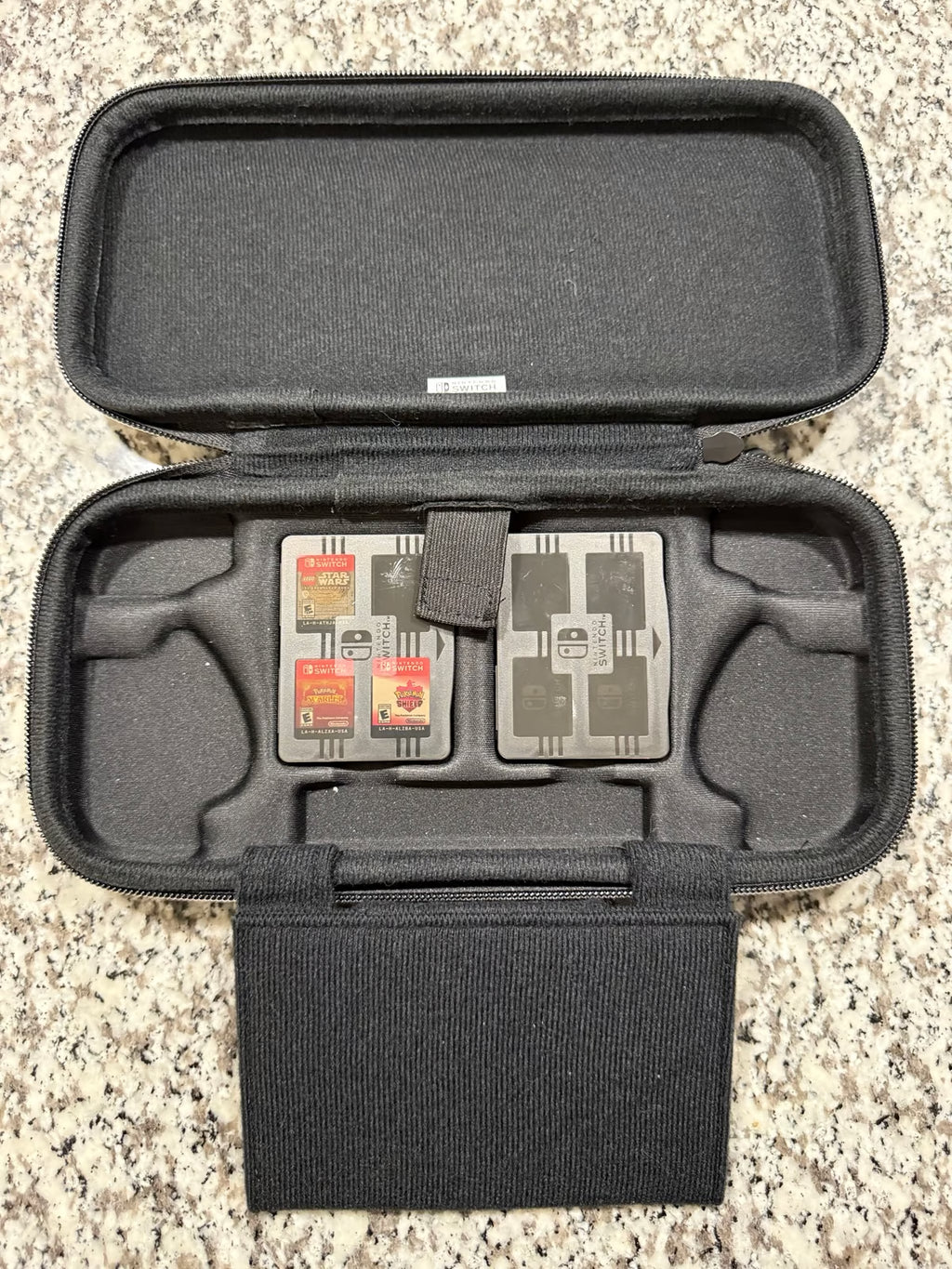 Nintendo Switch OLED + Games + Case 7P83