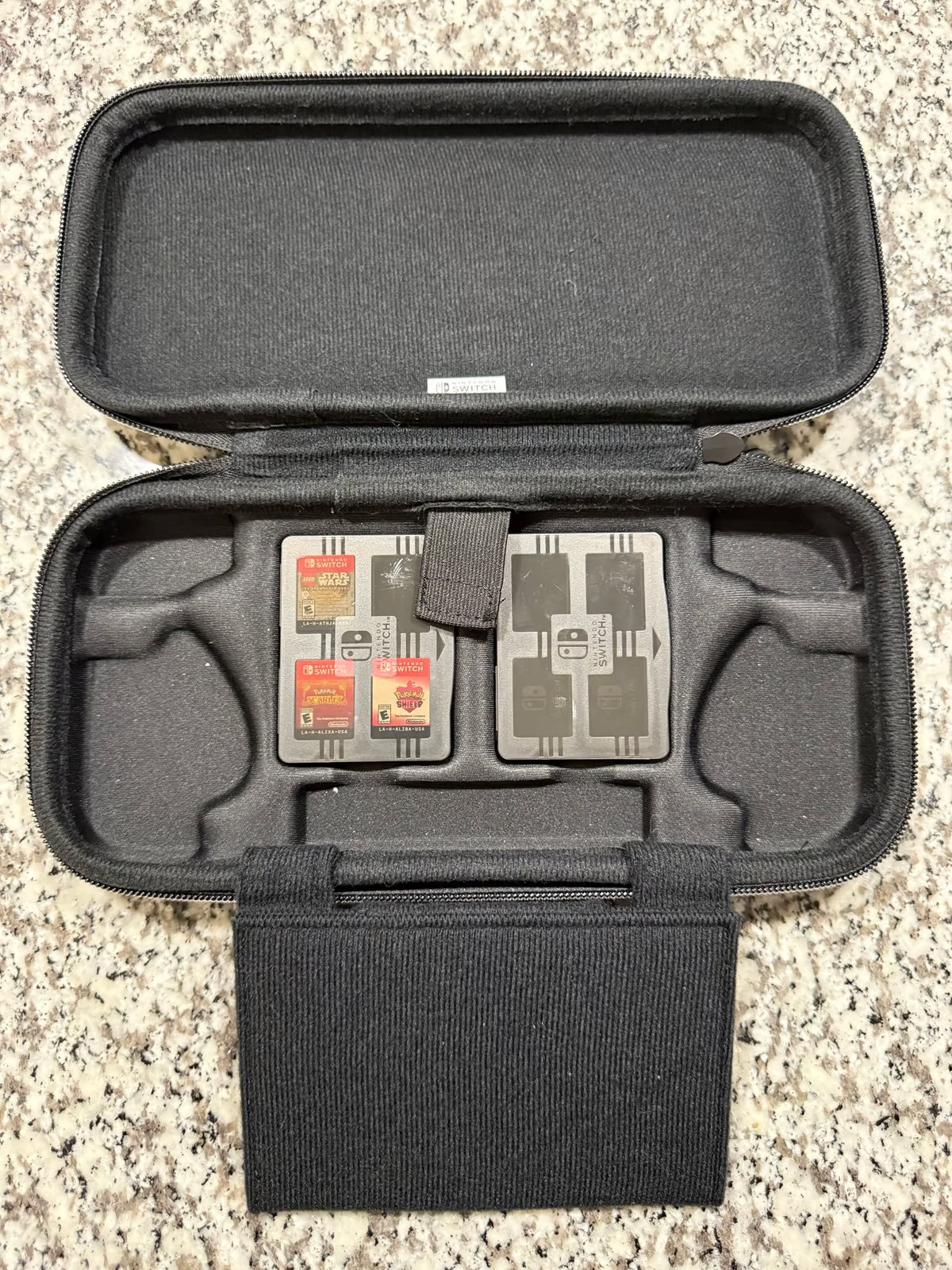 Nintendo Switch OLED + Games + Case 7P83