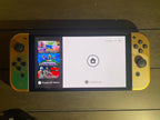 OLED Nintendo Switch - Legend of Zelda: Tears of the Kingdom Edition + 2 GAMES 2W58