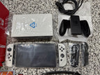 Nintendo Switch OLED + Games + Case 7P83